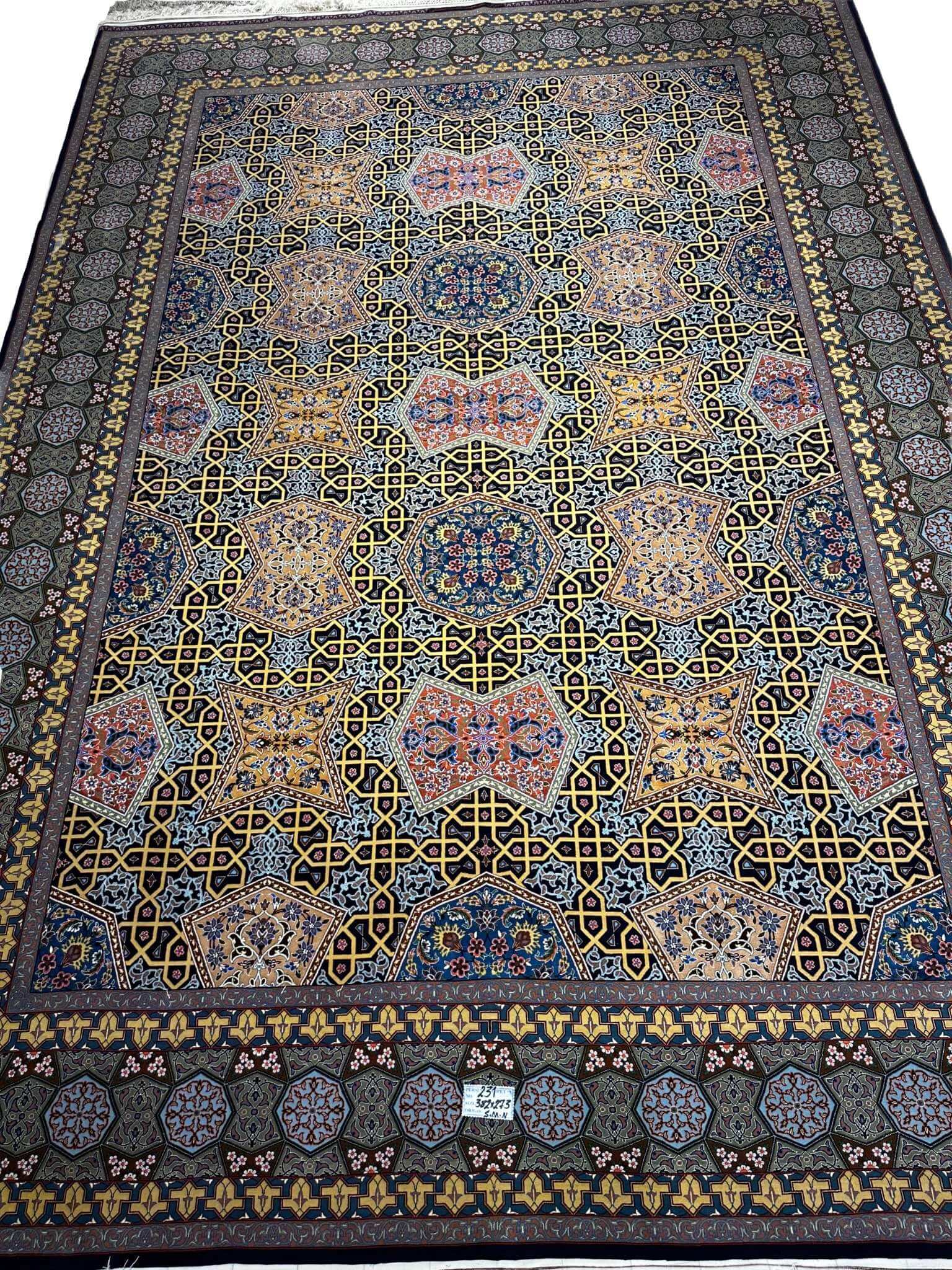 Exquisite hand-knotted Isfahan Persian area rug, crafted from wool and silk by Master Haghighie. Measuring 382x273 cm (12.5x9 feet) with a knot density of 870,000 per square meter, this luxurious rug brings elegance and tradition to any room.